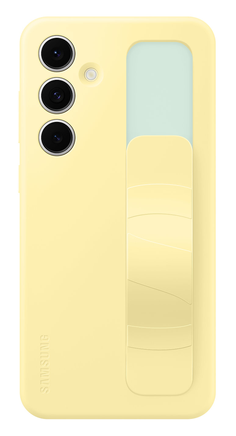 Otwarta frytkownica powietrzna z jedzeniem w środku, z dodatkami na blacie.