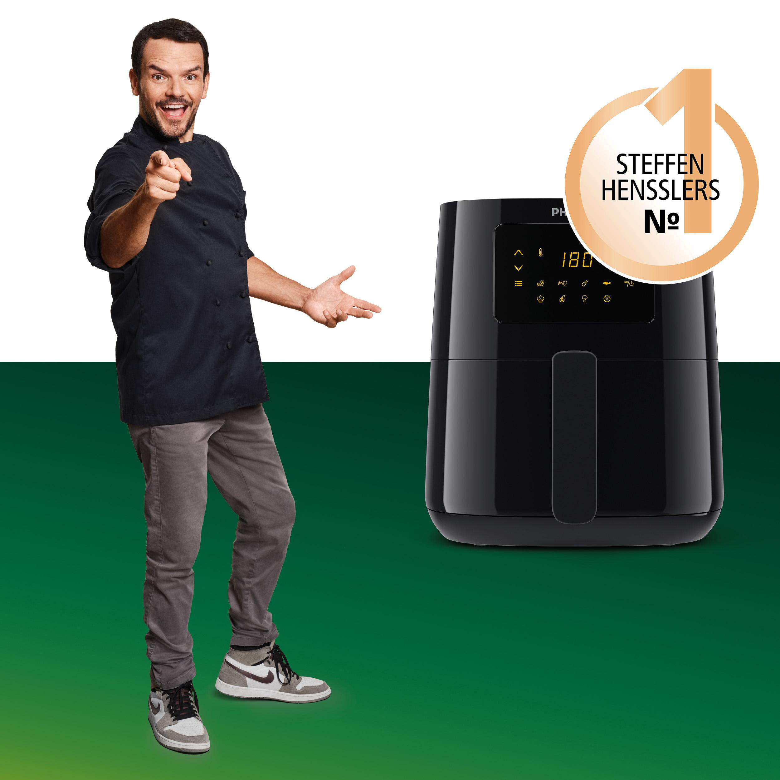 Produktverpackung für einen Philips OneBlade mit grünem Hintergrund.