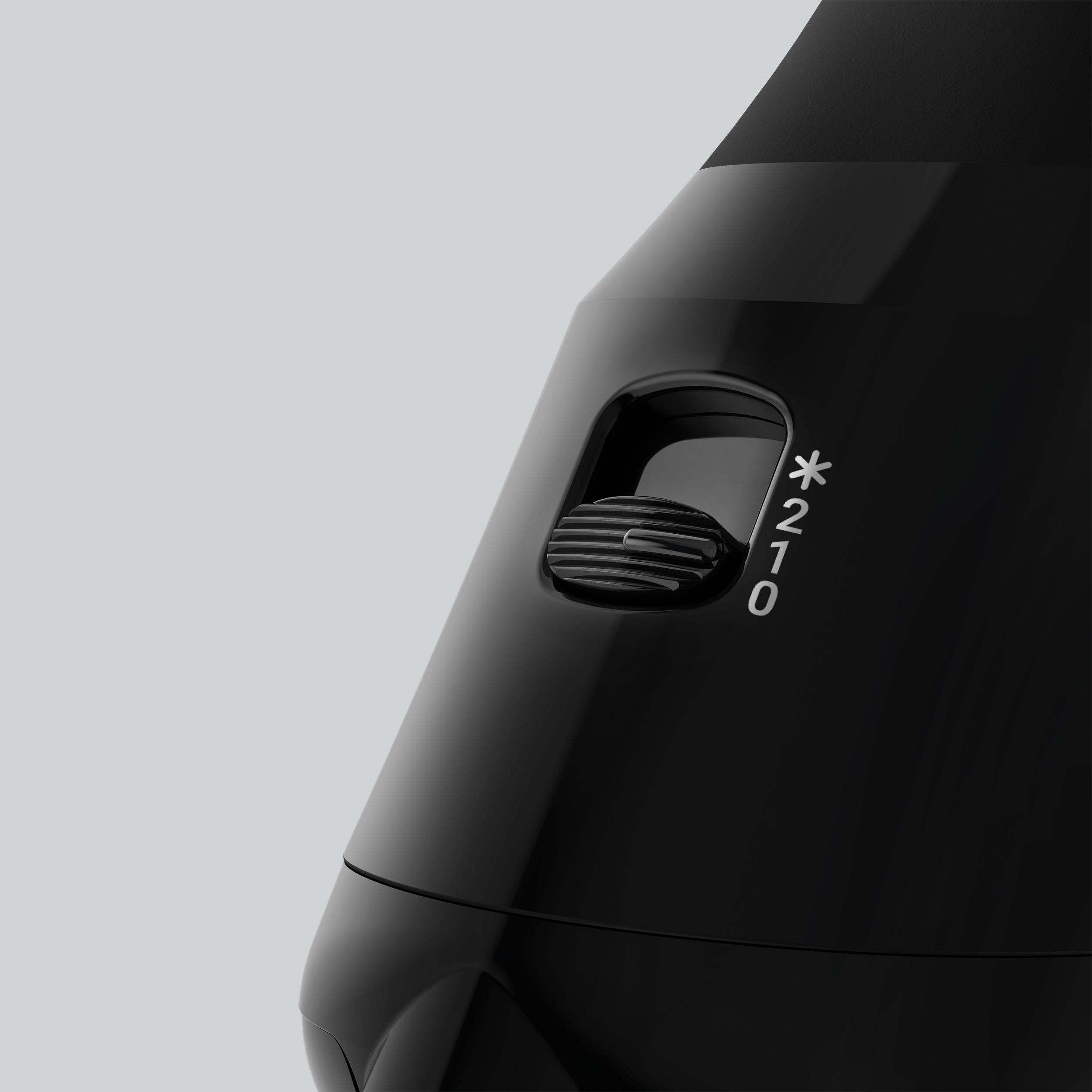 Schwarzes Gerät, glänzendes Finish, mit Drehknopf und Zahlen auf grauem Hintergrund.