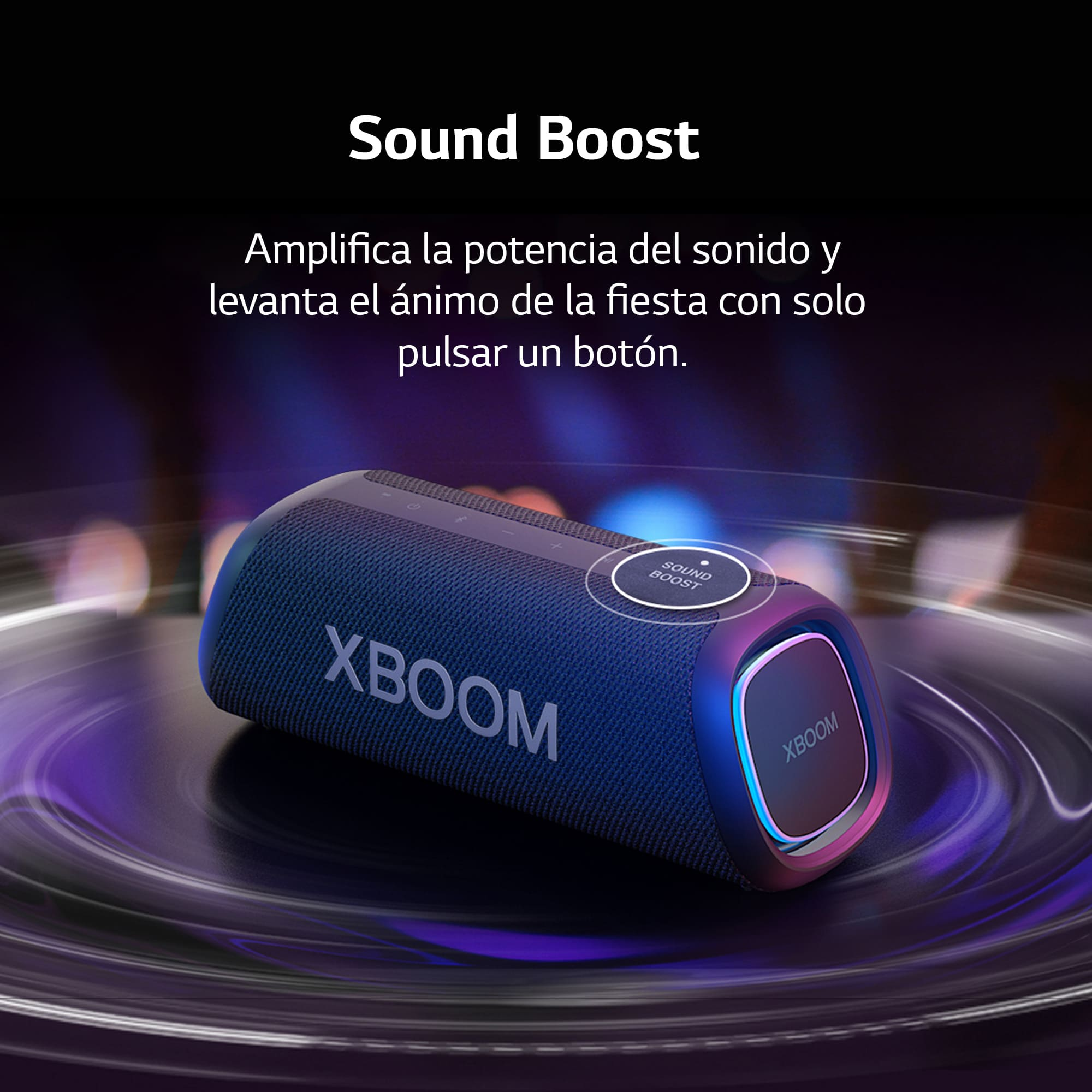 Altavoz azul con botón de refuerzo de sonido sobre una superficie negra.