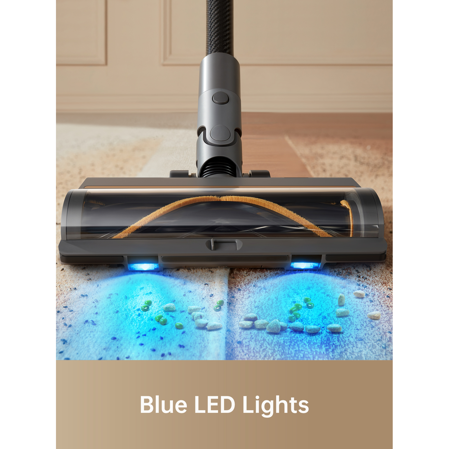 A vacuum cleaner head cleaning a carpet with blue LED lights illuminating debris.