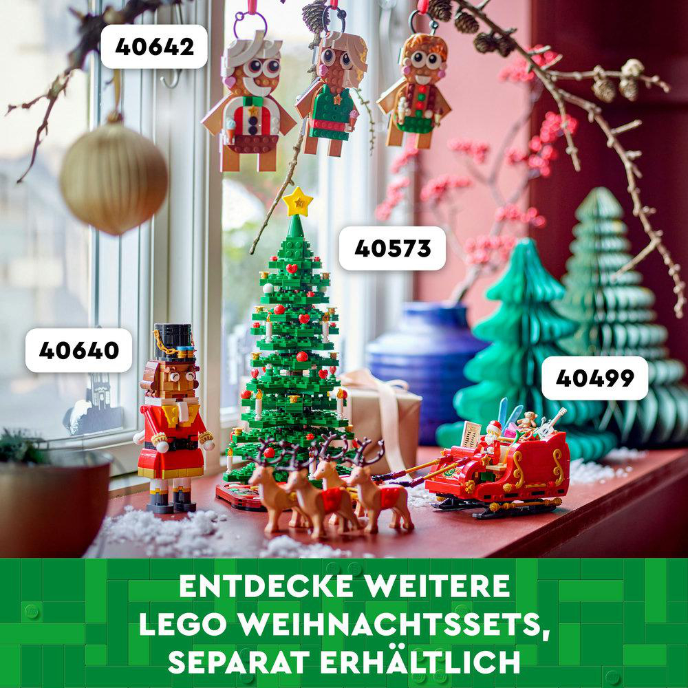 Weihnachts-Lego-Set mit verschiedenen Lego-Figuren und Dekorationsartikeln.