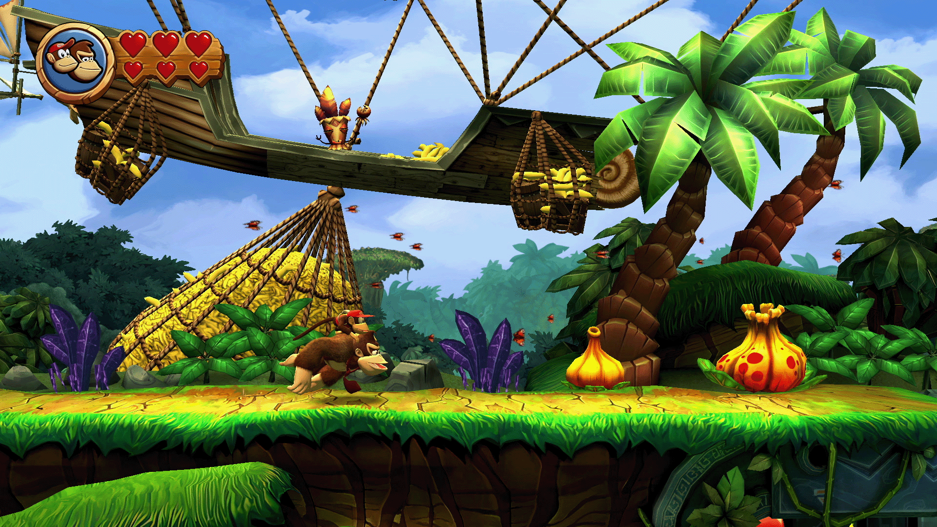 Donkey Kong Szene. Donkey Kong läuft, Bananen, Palmen, blauer Himmel.