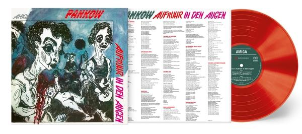 Albumcover mit Artwork, rote Vinylplatte. Figuren auf dem Cover mit deutschem Text. Rechts eine rote Vinylplatte.