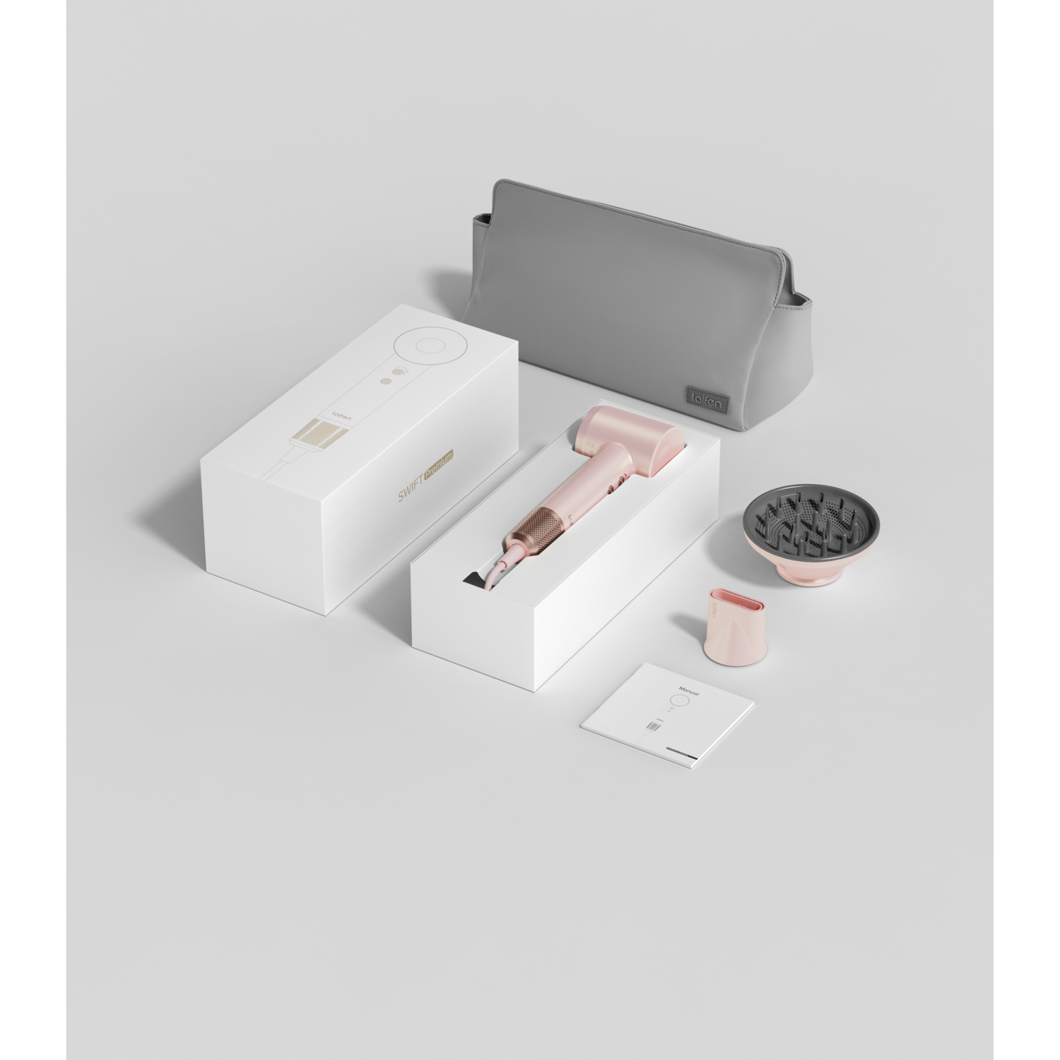 Roze en gouden föhn en accessoires in dozen, een grijze etui en een diffuser op een wit oppervlak.