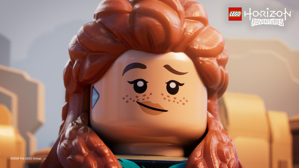 Gezicht van Aloy, personage uit Lego Horizon Adventures. Lego-logo zichtbaar rechtsboven.