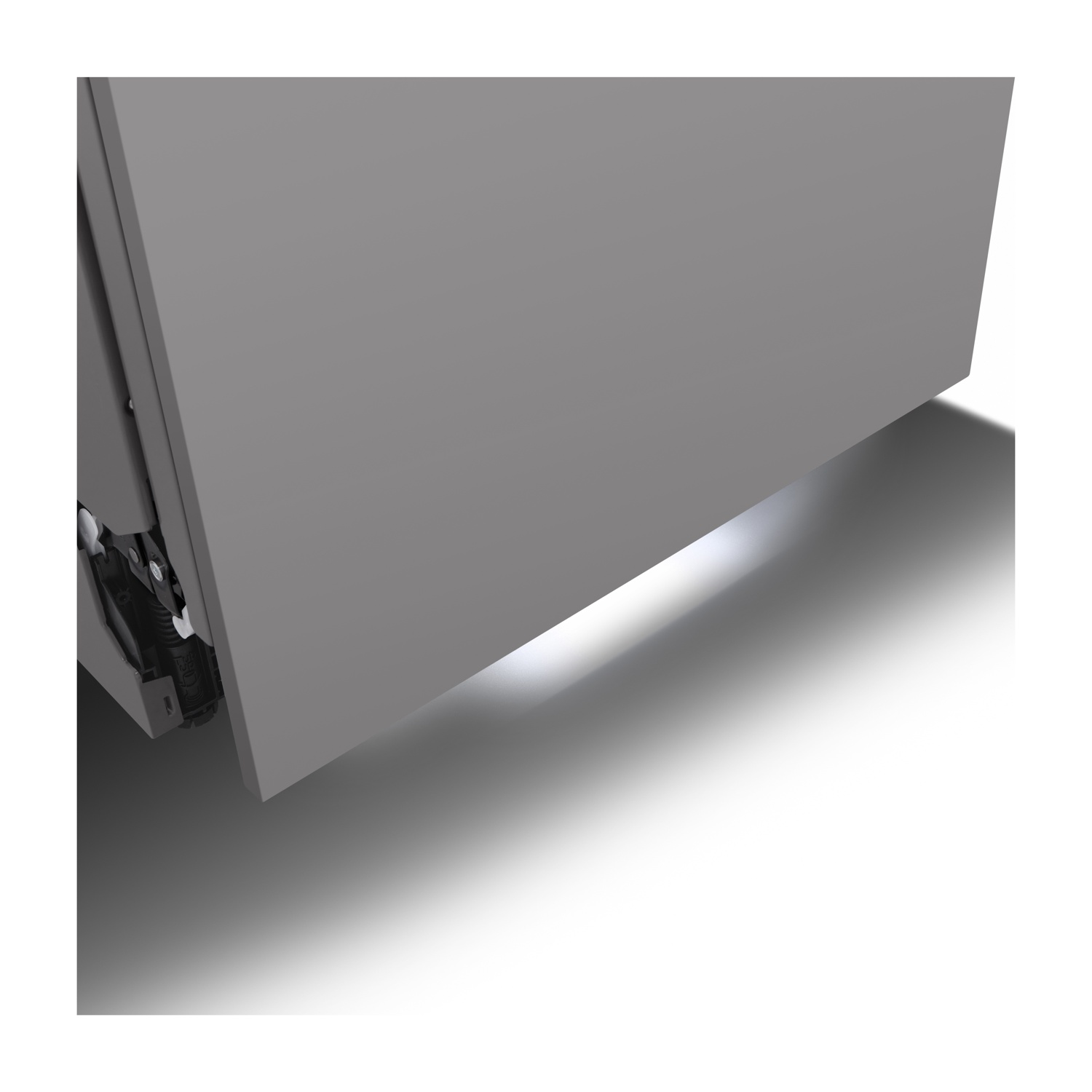 Un cassetto di un armadio grigio leggermente socchiuso, che rivela una luce che brilla dall'interno.
