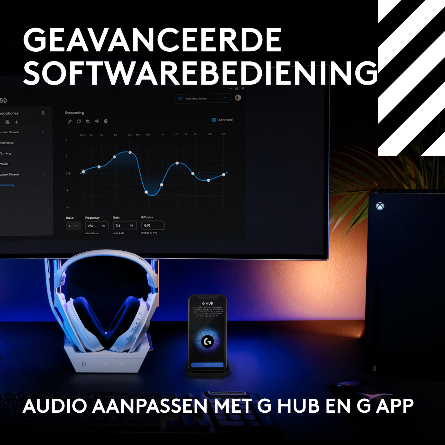 G HUB software interface on a monitor. A headset and a phone are on the desk. The text says 'Audio Adjust'.