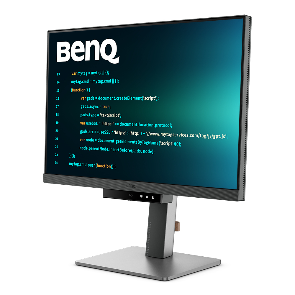 Un monitor BenQ mostrando código, con su soporte sobre una superficie blanca.