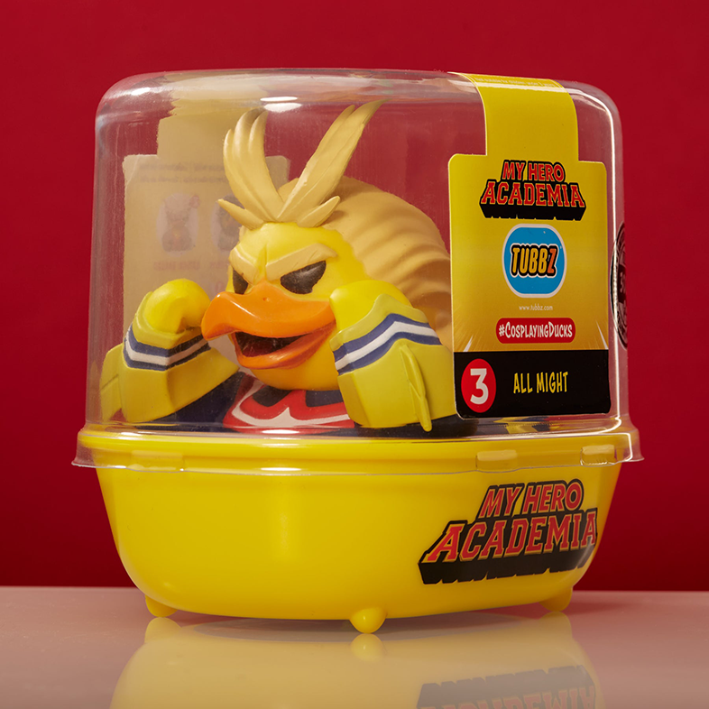 Sárga kacsajátékfigura, mint All Might a 'My Hero Academia'-ból, egy kapszulában.
