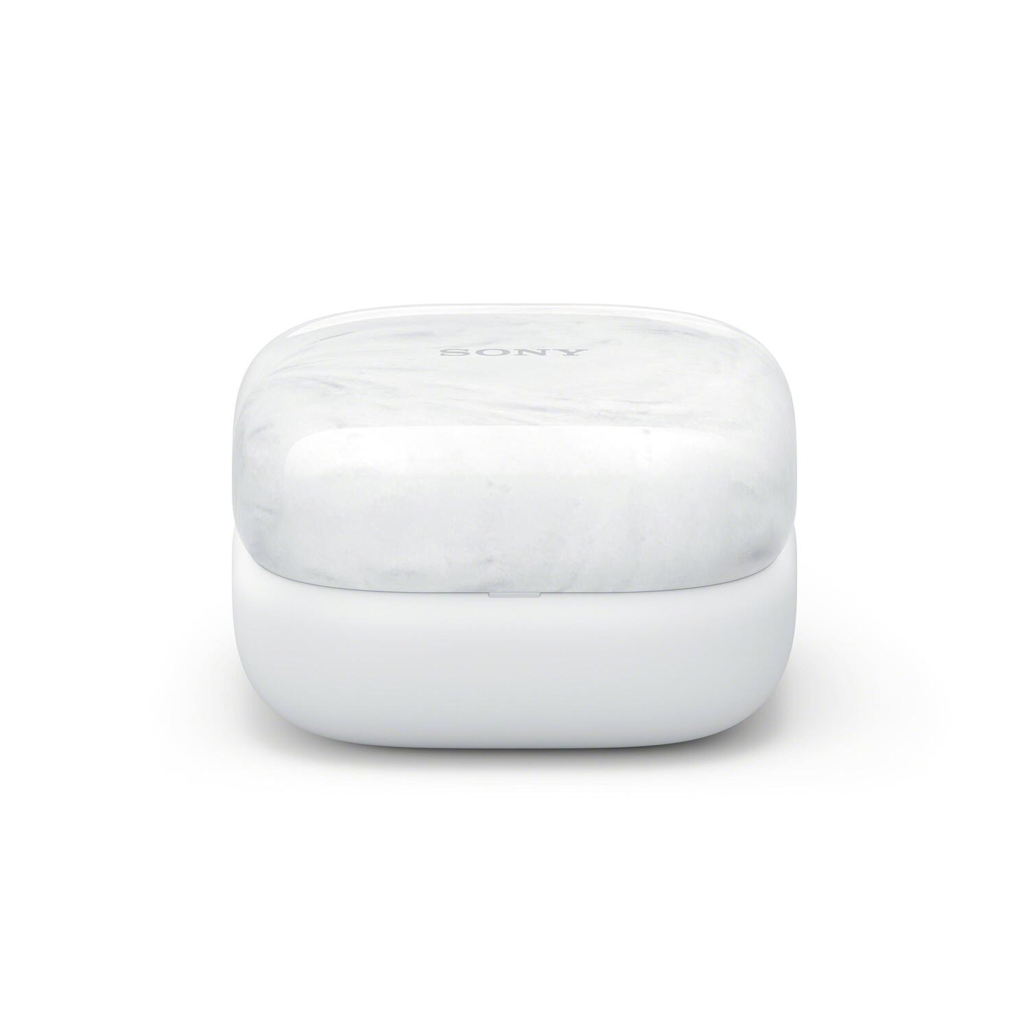 Étui blanc pour écouteurs Sony. Le dessus a un motif marbré, le dessous est blanc uni.