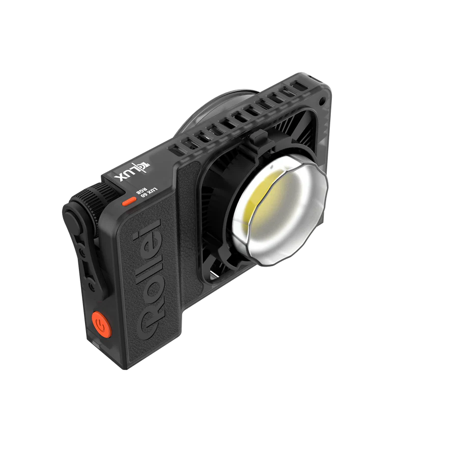 Rollei LUX 50 RGB LED-Leuchte, schwarz und orange.
