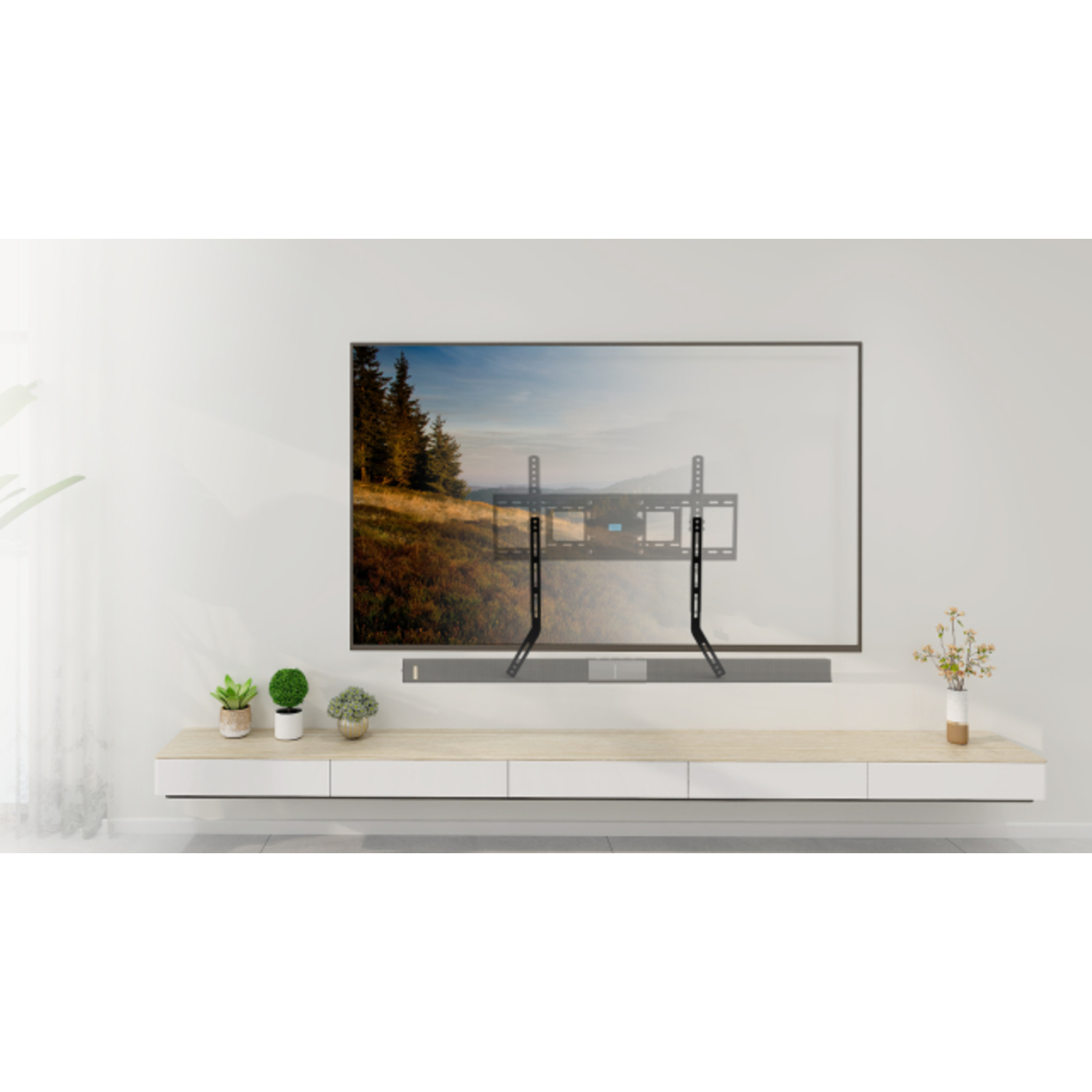 A TV mounted on a white wall above a white shelf. A soundbar sits below the TV.