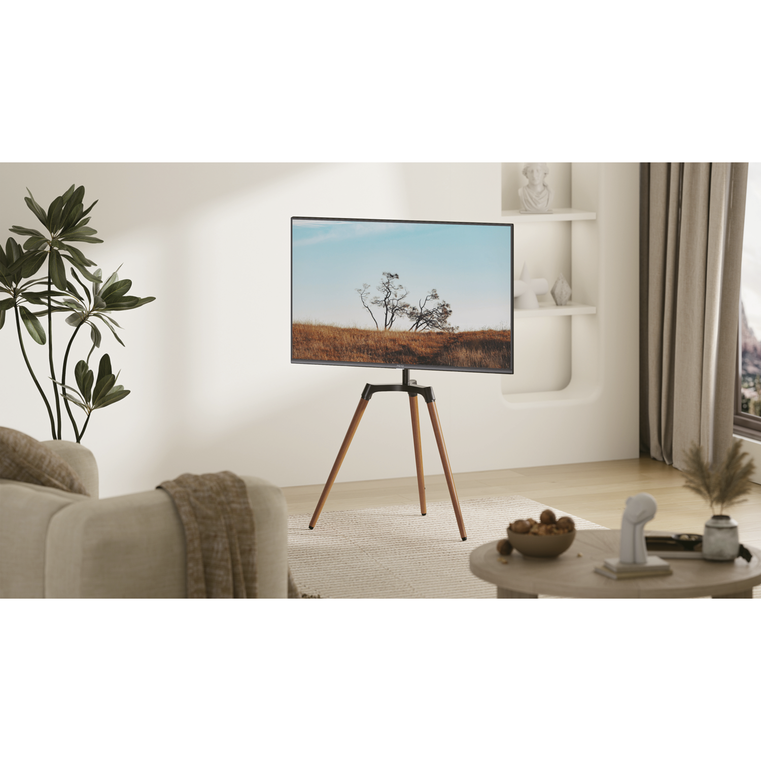 A TV on a wooden stand, set against a white wall with a view of trees and a field outside.