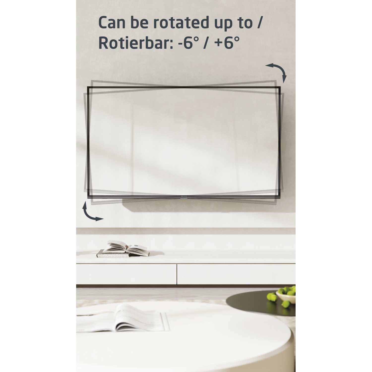 A TV screen rotated slightly. A white table and a white coffee table.