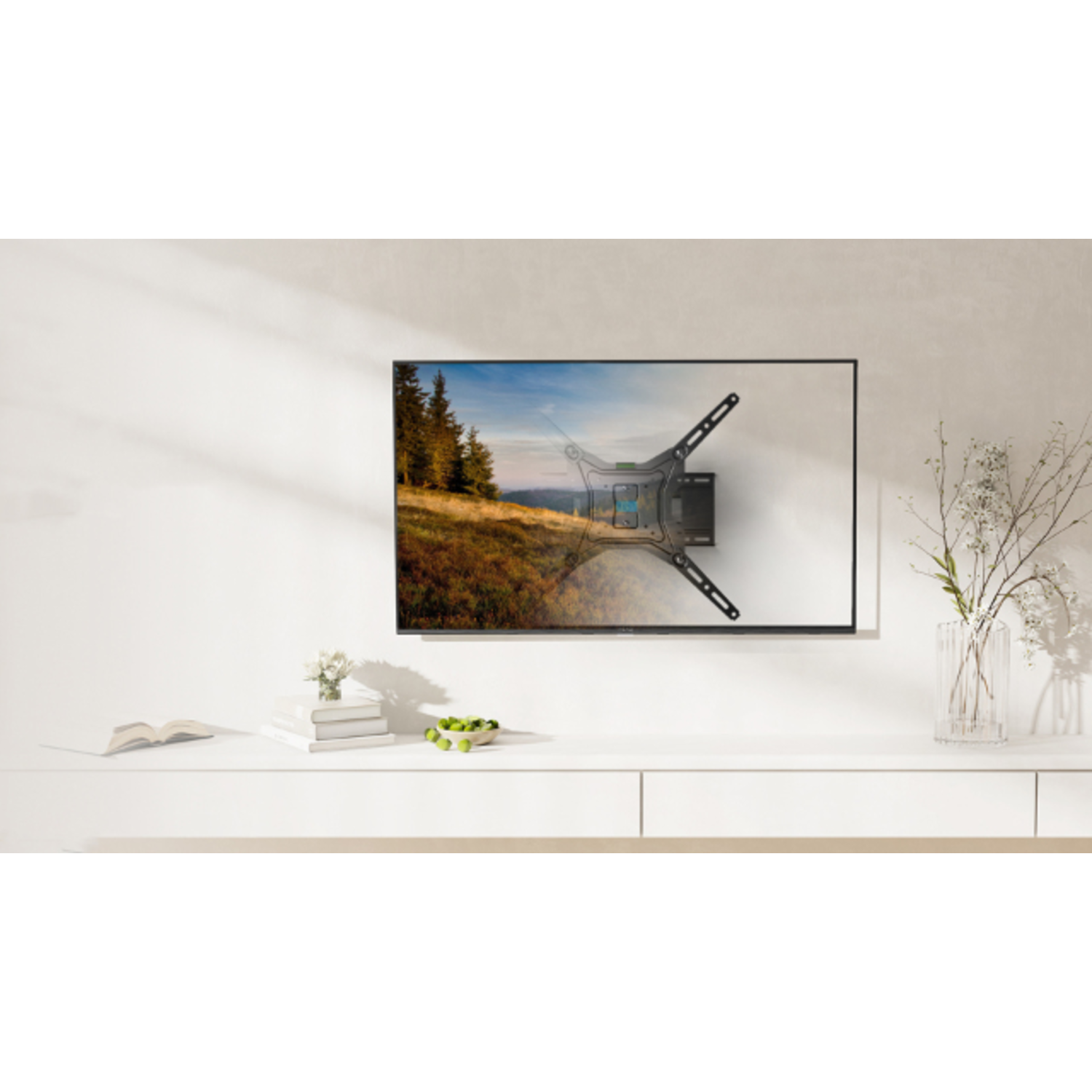 A TV mounted on a wall with a bracket, with a white cabinet and vase in front.