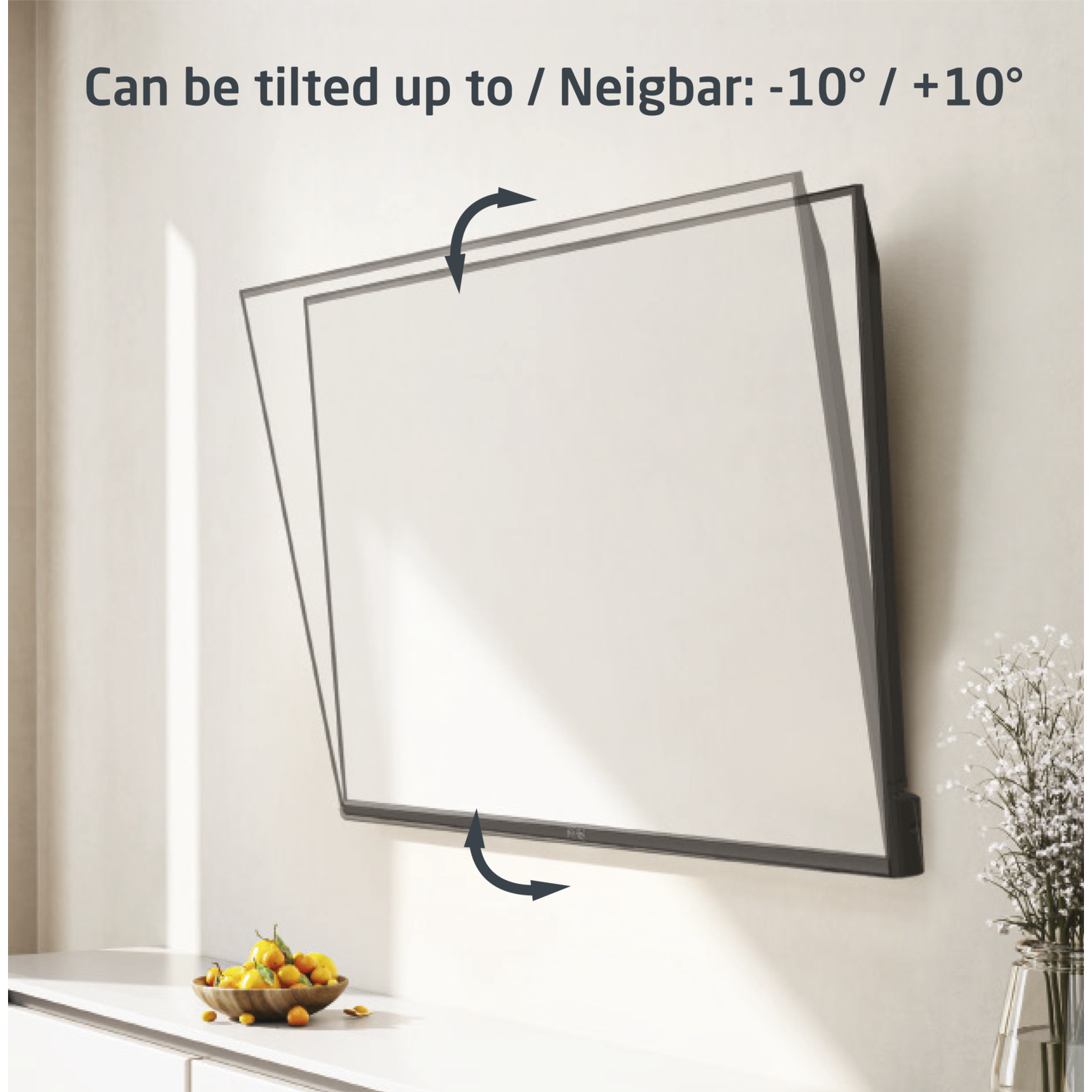 A black TV mounted on a white wall, with a fruit bowl below and arrows indicating tilt.