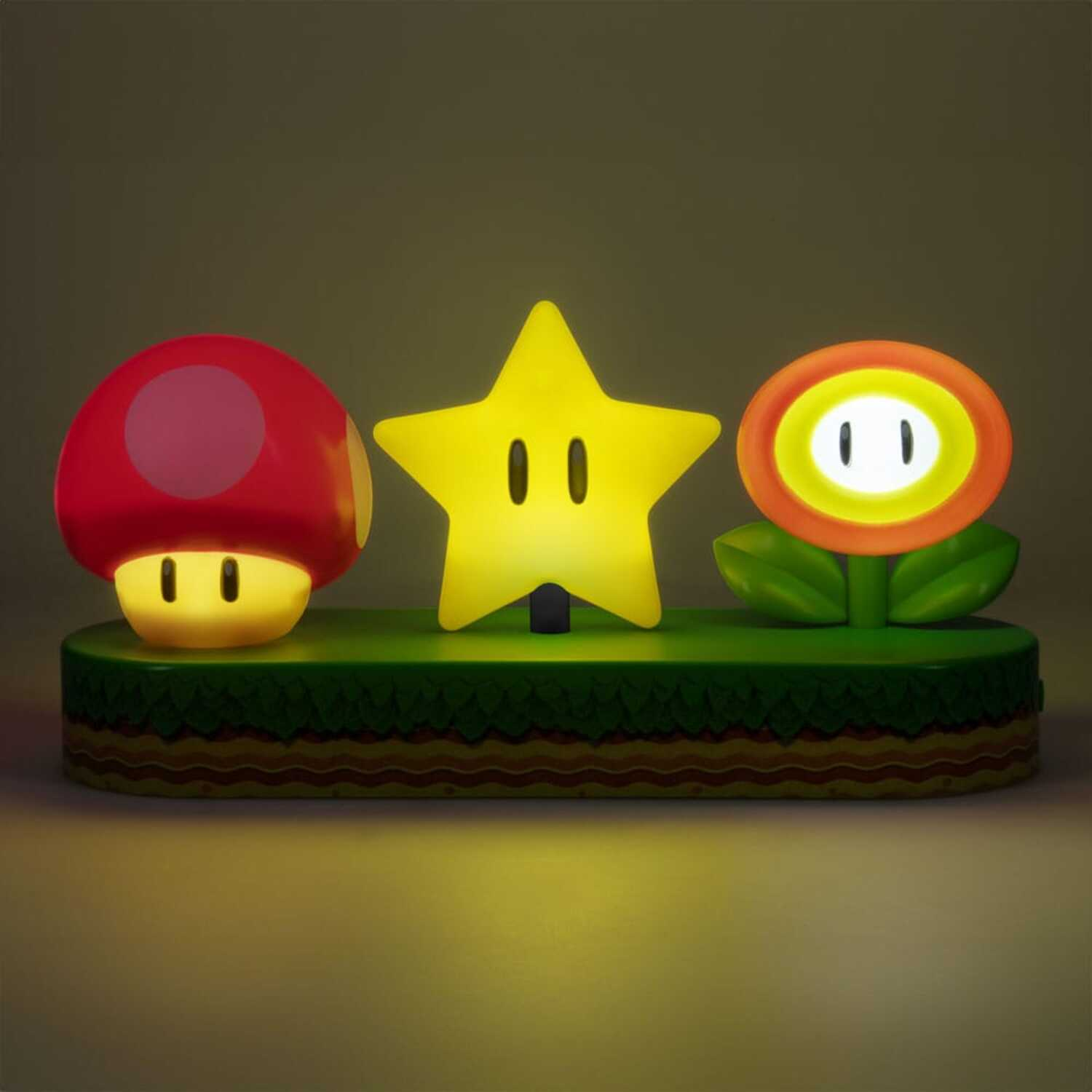 A light up display featuring Mario, a star, and a flower.