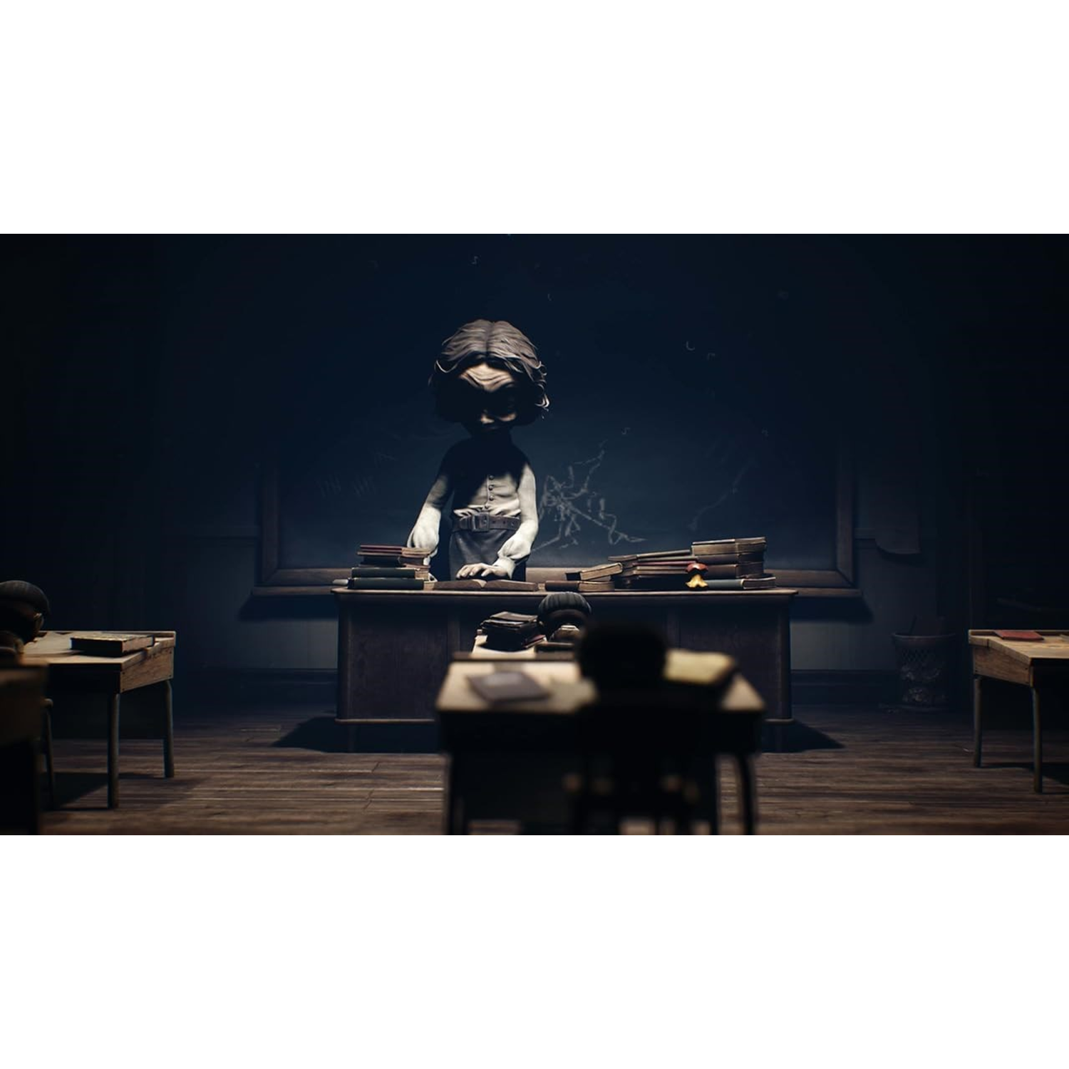 Dark scene with a teacher figure at a desk, books, and empty desks.