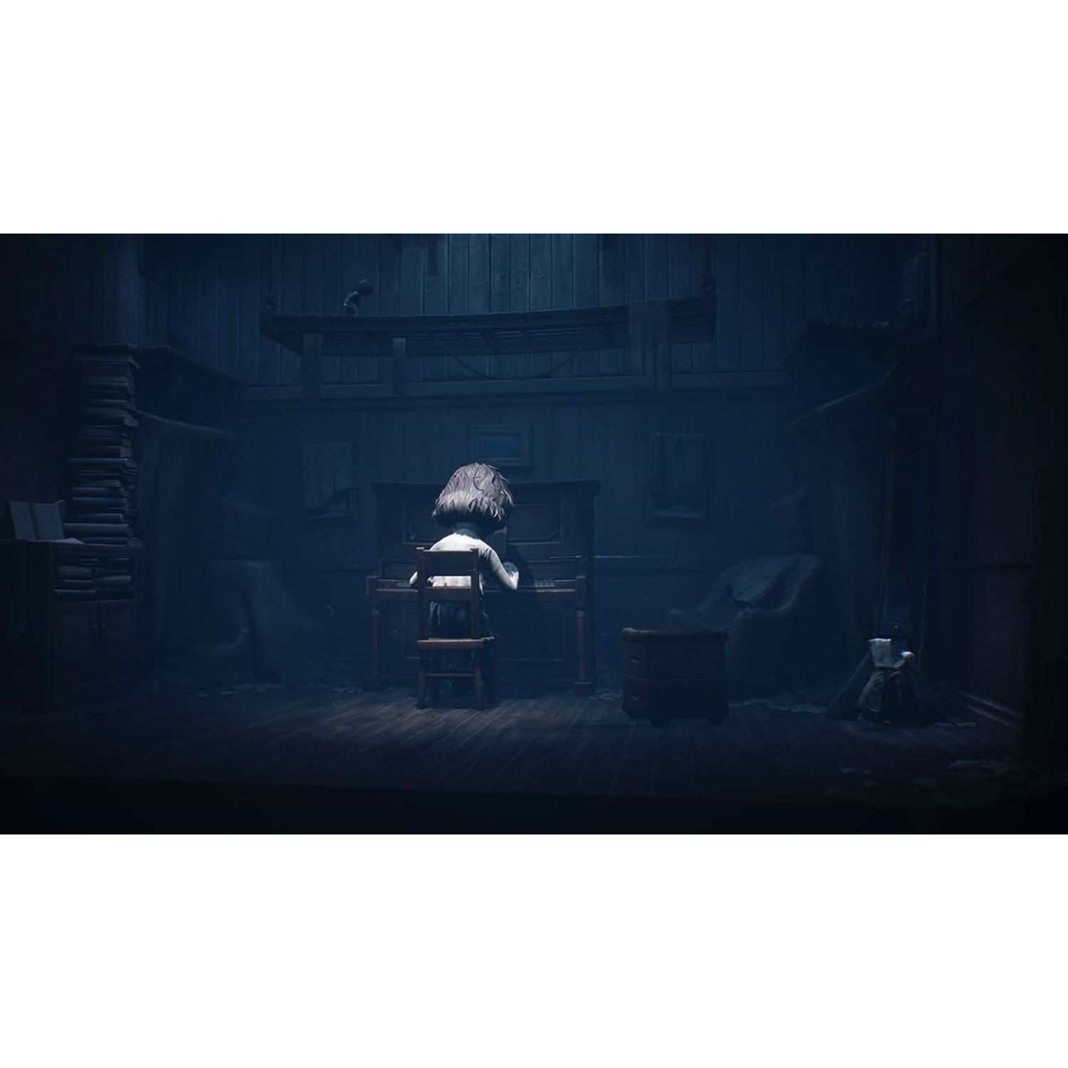 A child sits at piano, playing. Dimly lit room, books, and a figure visible. Dark.
