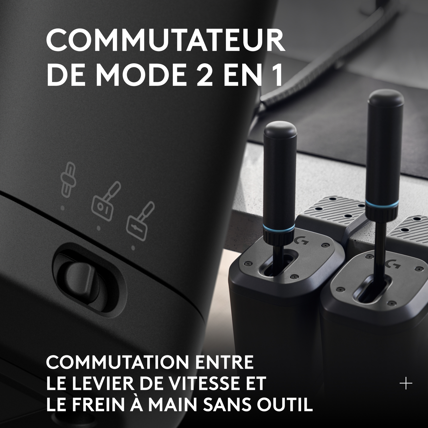 Gros plan sur un panneau de commande noir avec des boutons et deux leviers noirs avec des touches bleues.