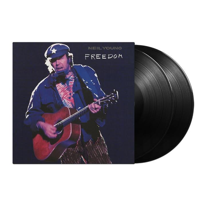Neil Young Albumcover. Er spielt Gitarre, trägt ein blaues Hemd und einen Hut und hat zwei schwarze Schallplatten.
