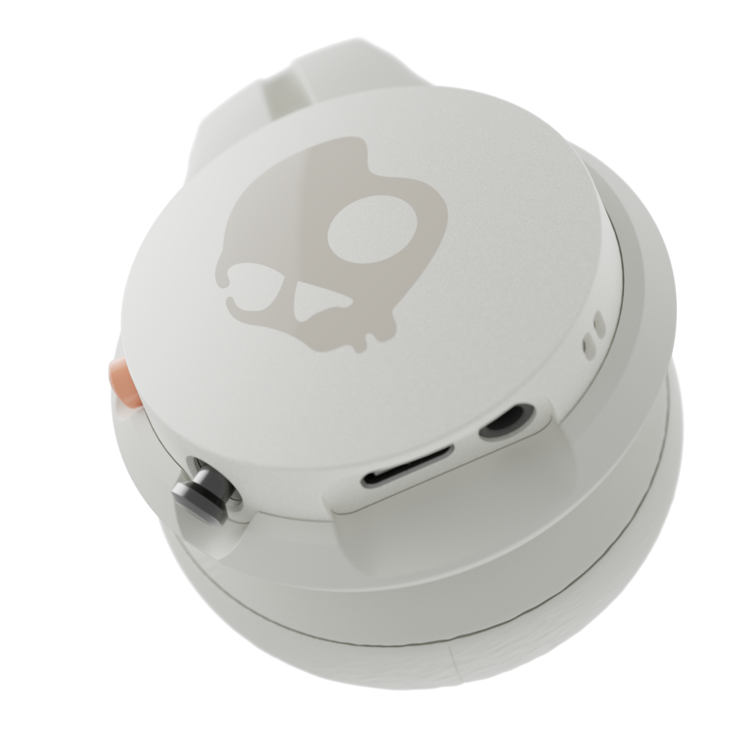 White and gray Skullcandy headphones. The top is white with a skull logo. Black background.