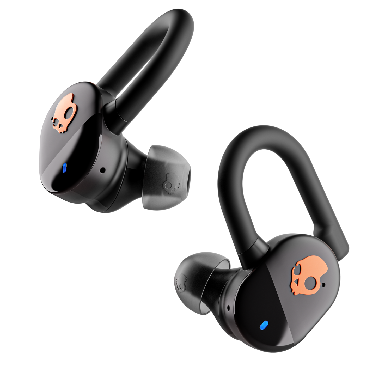 Two black Skullcandy earbuds with orange logo, ear hooks, and black background.