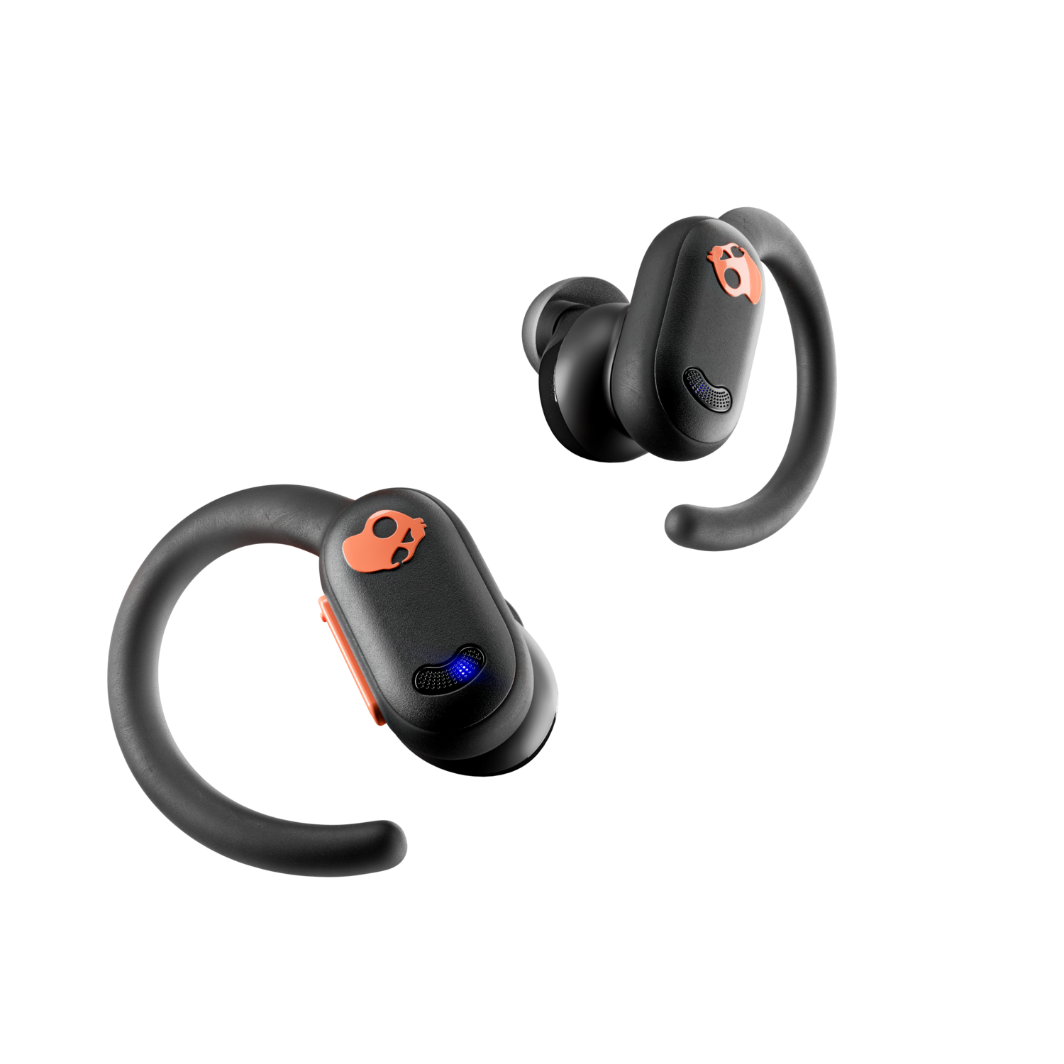 Black Skullcandy earbuds with orange accents on a black background.