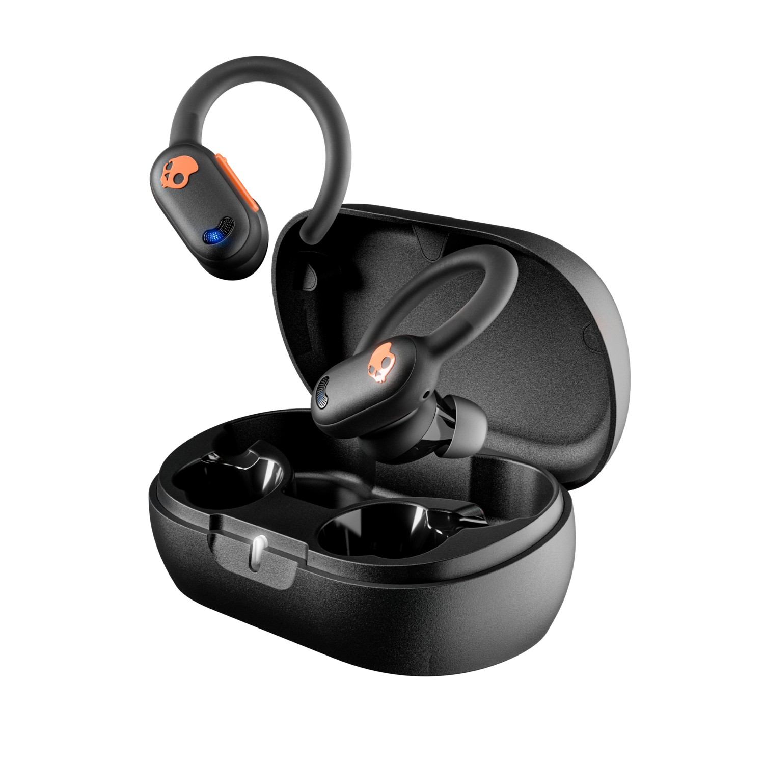 Black wireless earbuds with orange accents, in a charging case, set against a black backdrop.