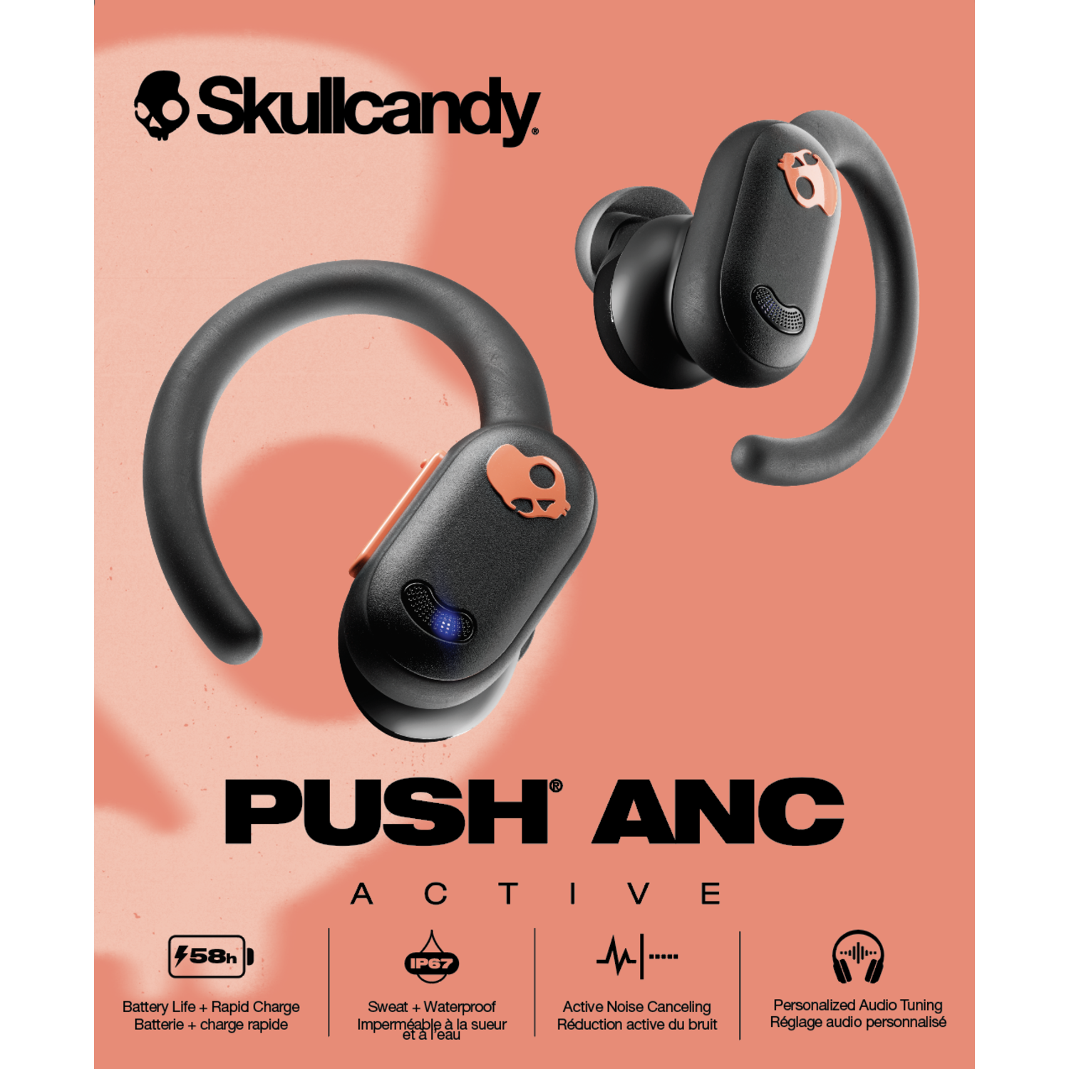Black Skullcandy earbuds with orange accents, and a charging case. Black background.