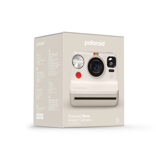 Polaroid Now Sofortbildkamera in einer Box. Die Kamera ist weiß und hat einen roten Knopf.