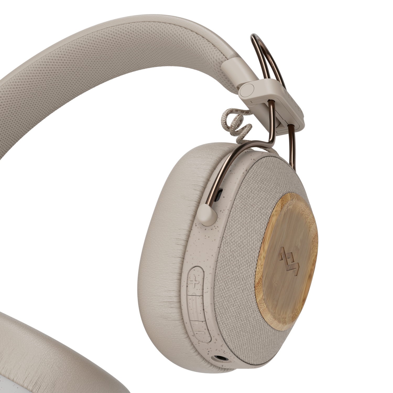 Beige koptelefoon met houten accenten, zwarte achtergrond.