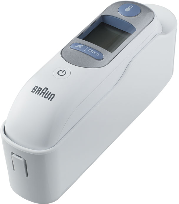 Thermomètre Braun blanc dans une base de charge blanche.