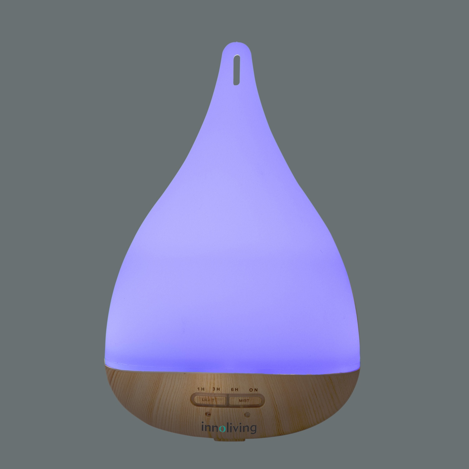 Un diffusore di aromi a forma di goccia con base in legno e parte superiore viola brillante.