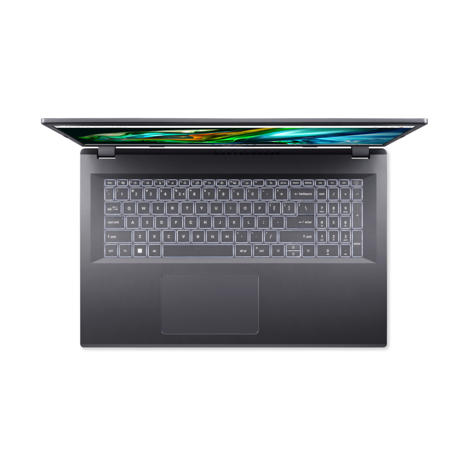 Top view of a gray laptop. The screen is open. Keyboard with white backlit keys. Black background.