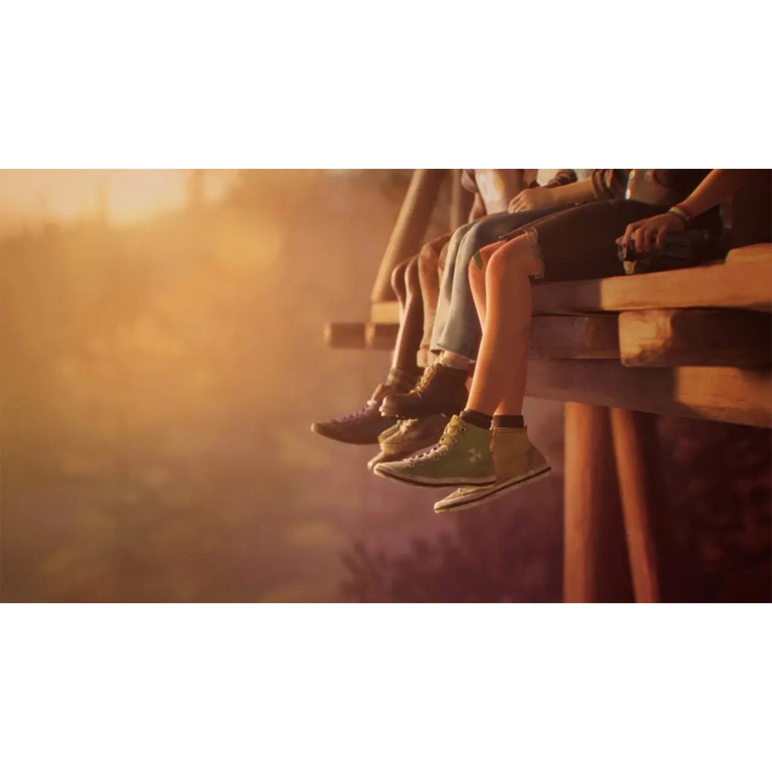 Benen en voeten van mensen die over een houten constructie hangen, met groene en gele schoenen. De achtergrond is een zonsondergang.