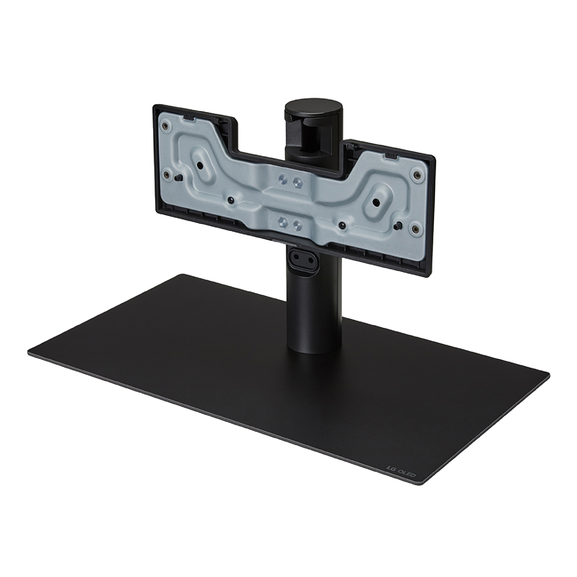 Base de soporte de TV negra. Tiene un marco de metal para montar un televisor.