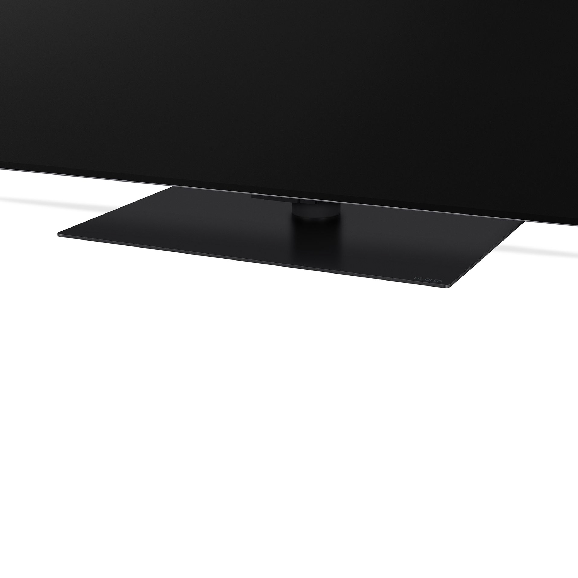 Soporte de TV negro con base rectangular, y parte visible del televisor arriba.
