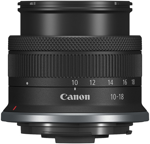 A black Canon lens with numbers and writing on it. The lens is black and round.