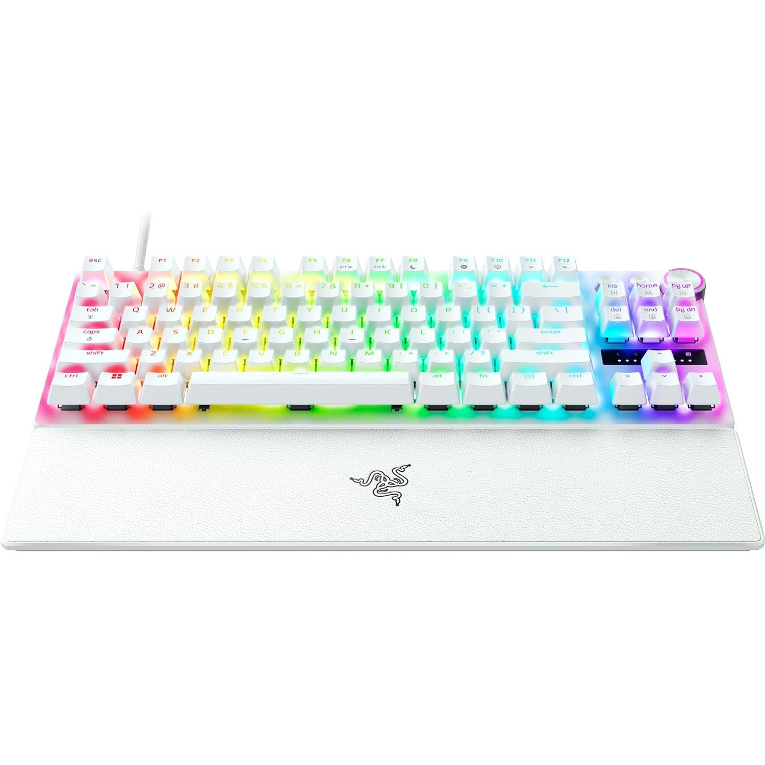 White keyboard with rainbow lighting and a wrist rest on a white surface.