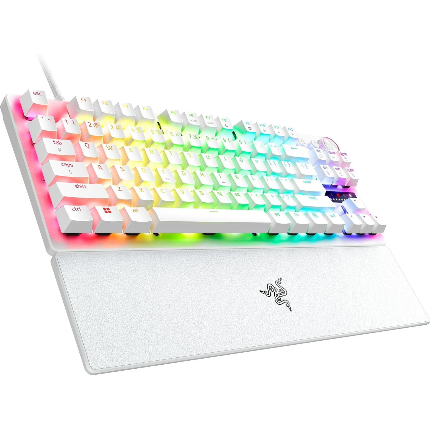 White Razer keyboard with rainbow LED lights. The keyboard rests on a white wrist rest pad.