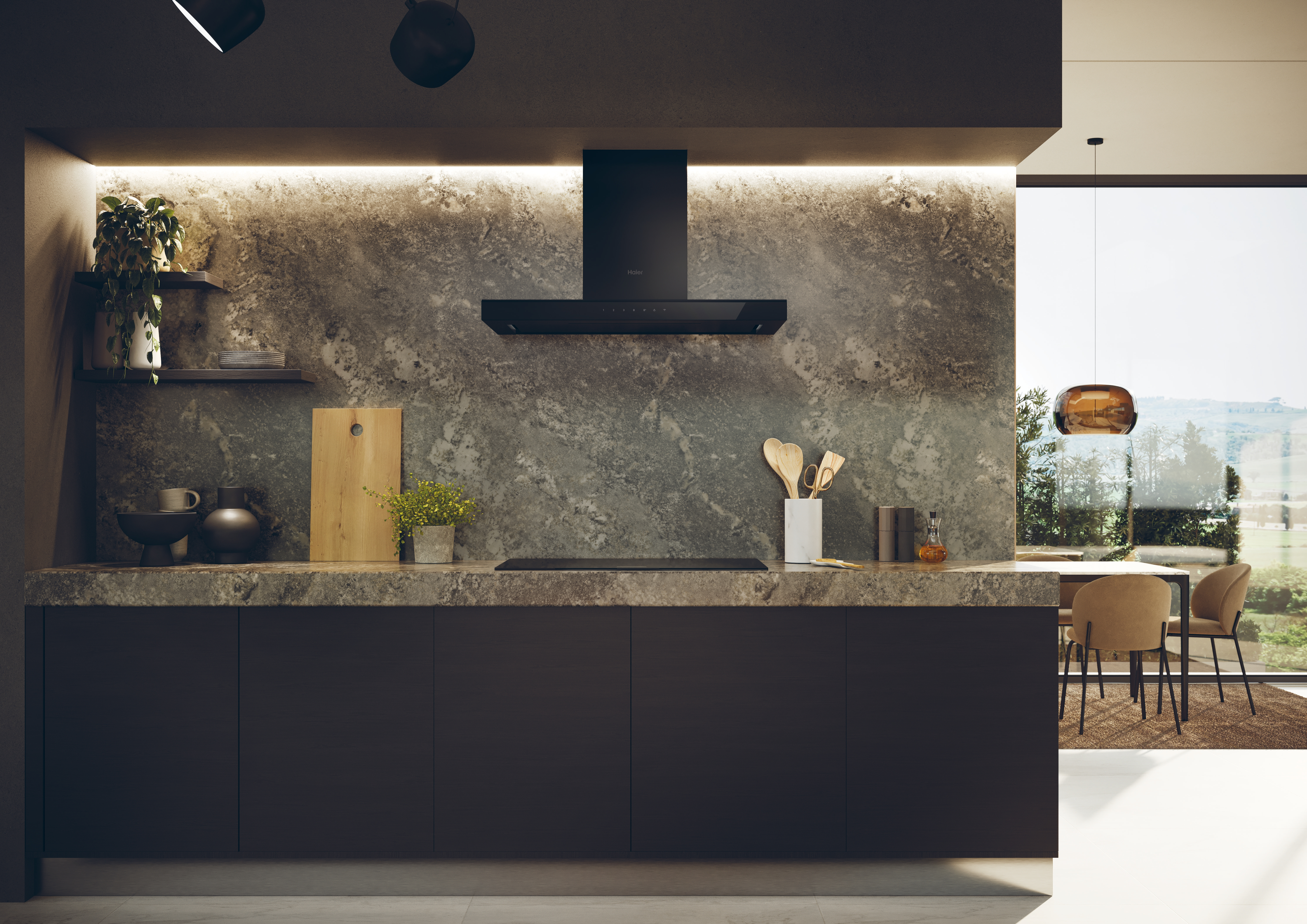 Interior de cocina moderno con encimera oscura, armarios y campana extractora. Ventana al fondo.