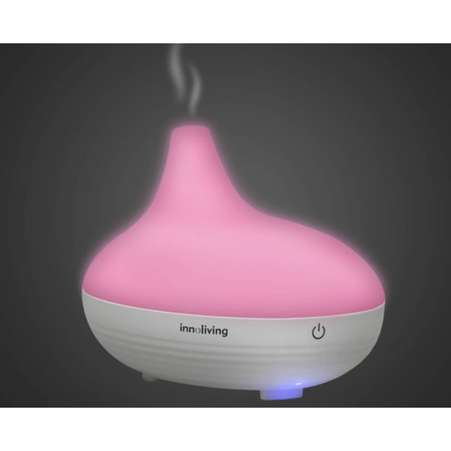 Diffusore di oli essenziali rosa e bianco. La parte superiore è rosa e ha una base bianca con un pulsante di accensione.