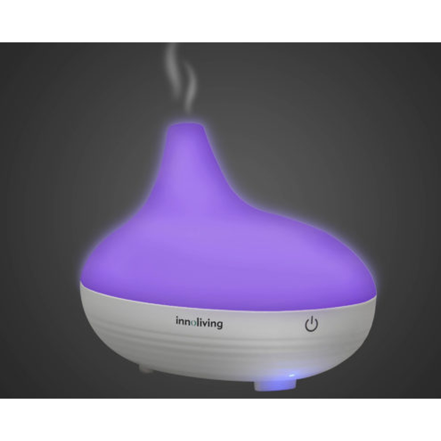 Un diffusore per aromaterapia con parte superiore viola e base bianca, che emette vapore.