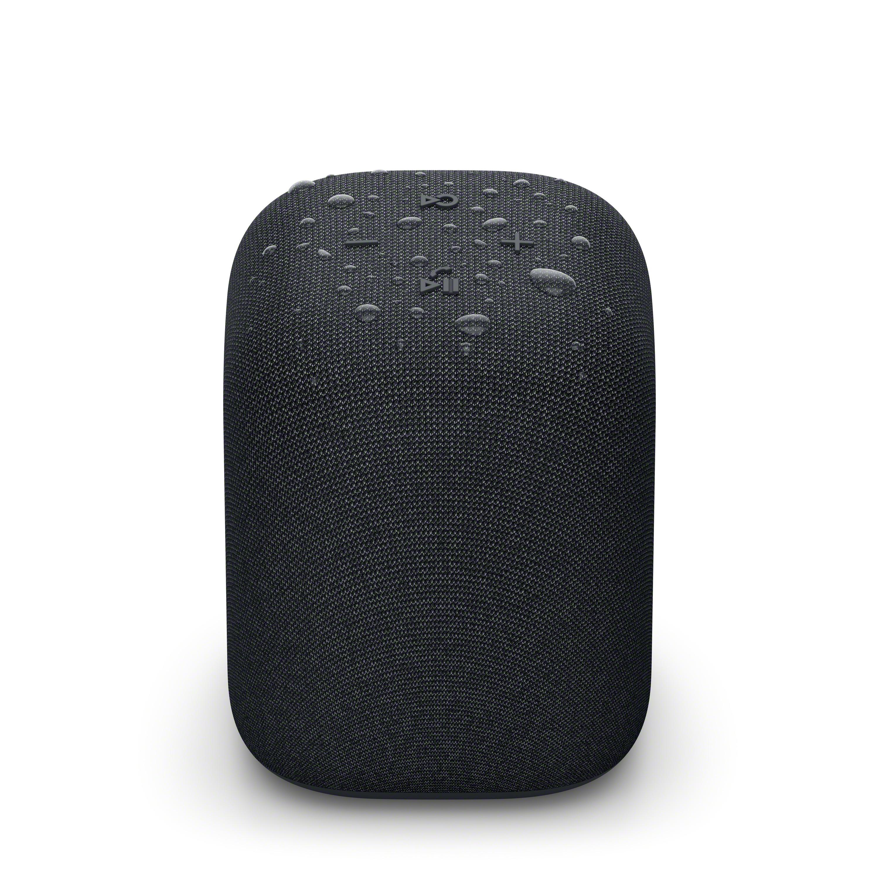 Ein schwarzer Lautsprecher mit Wassertropfen, vor weißem Hintergrund.