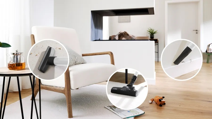 Biały fotel z odkurzaczem czyszczącym dywan. Wstawki pokazują szczegóły.