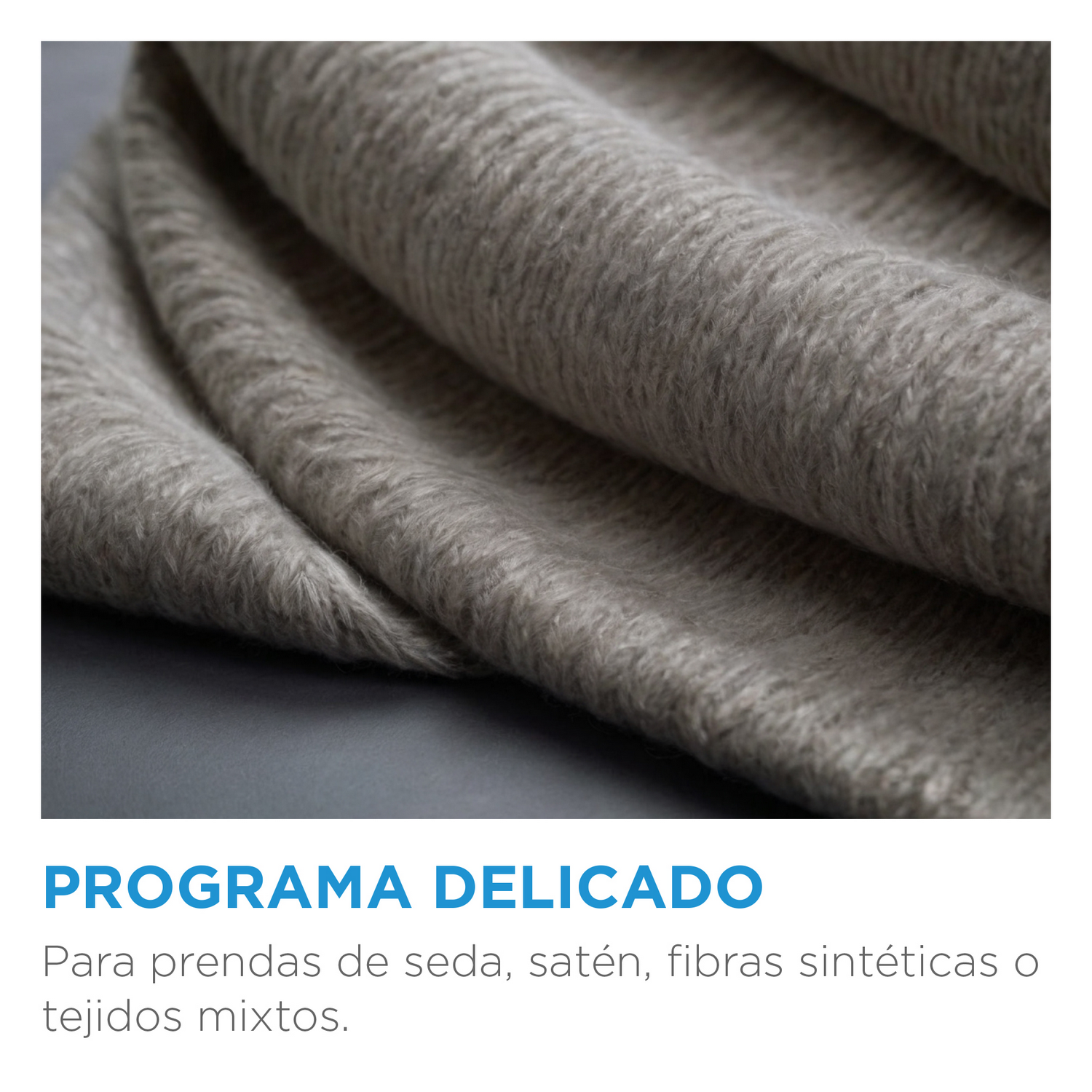 Primer plano de una tela suave y gris con texto sobre programas delicados.