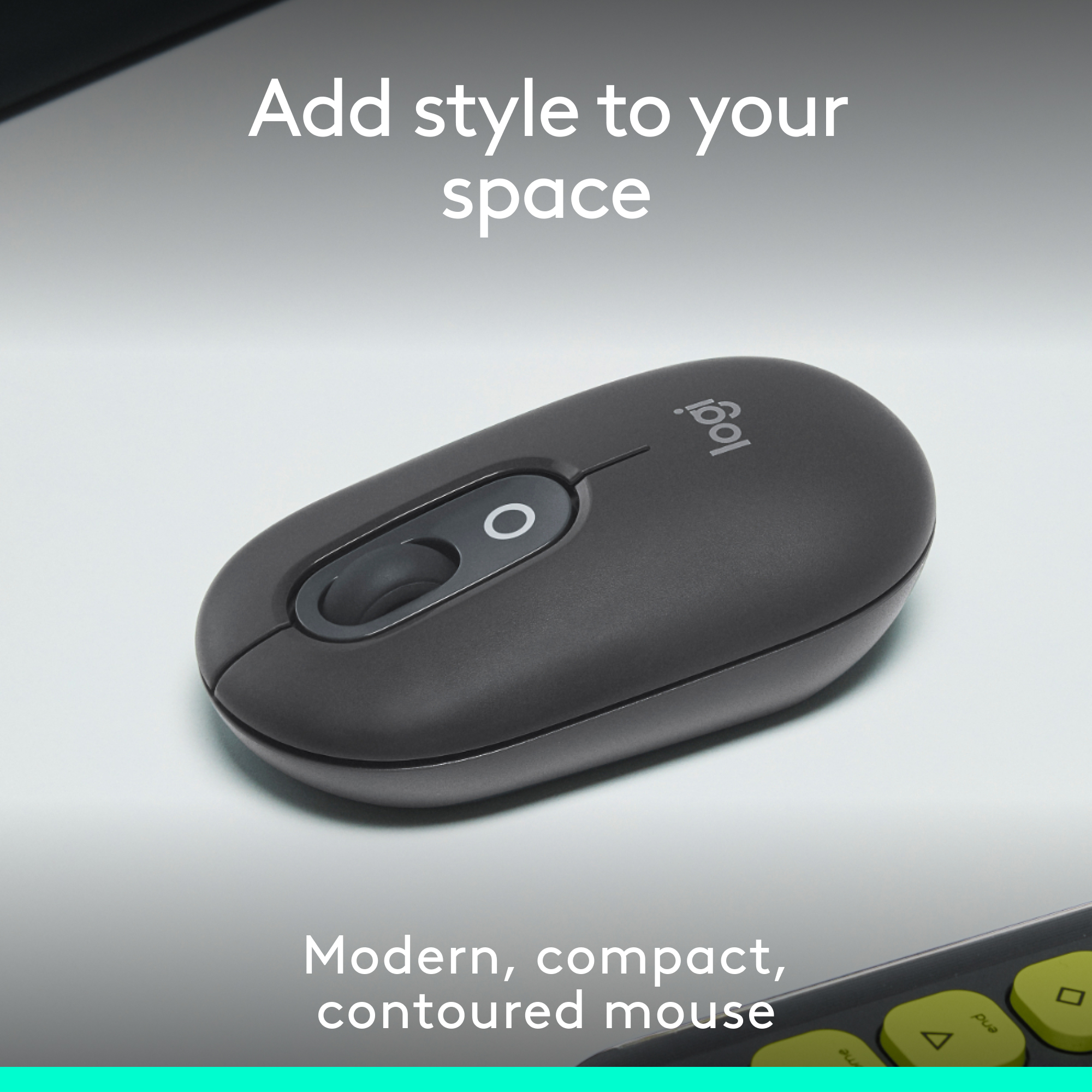 Eine dunkelgraue, ergonomische Maus auf weißer Oberfläche, Text wirbt für Stil.