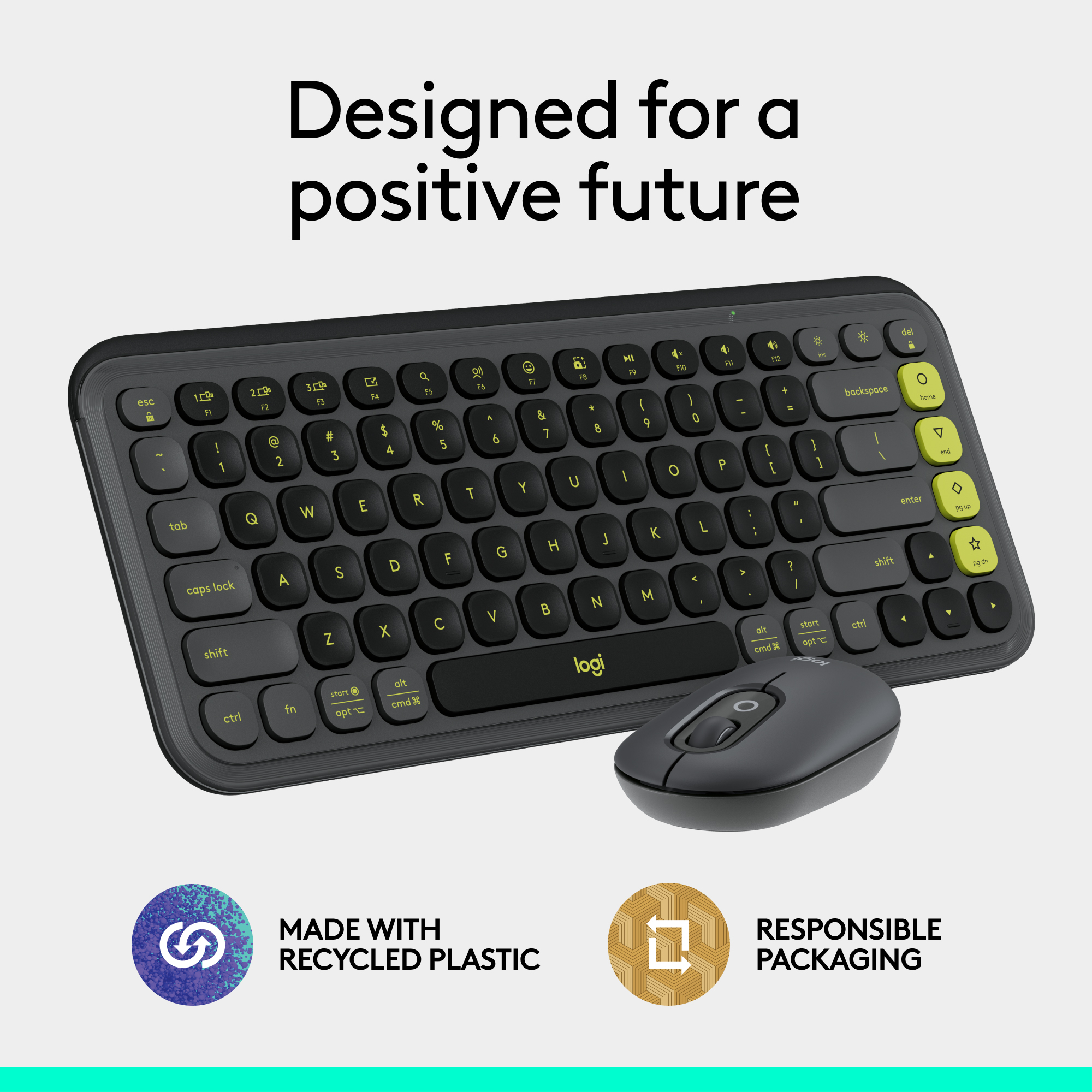 Clavier noir et gris avec souris. Texte : 'Conçu pour un avenir positif'.